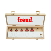 Freud 5-piece round over/beading bit set with red carbide cutters and 1/4" shank in wooden case.