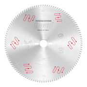 Circular saw blade with carbide-tipped teeth, central arbor hole, and red Freud branding markings on silver steel surface.