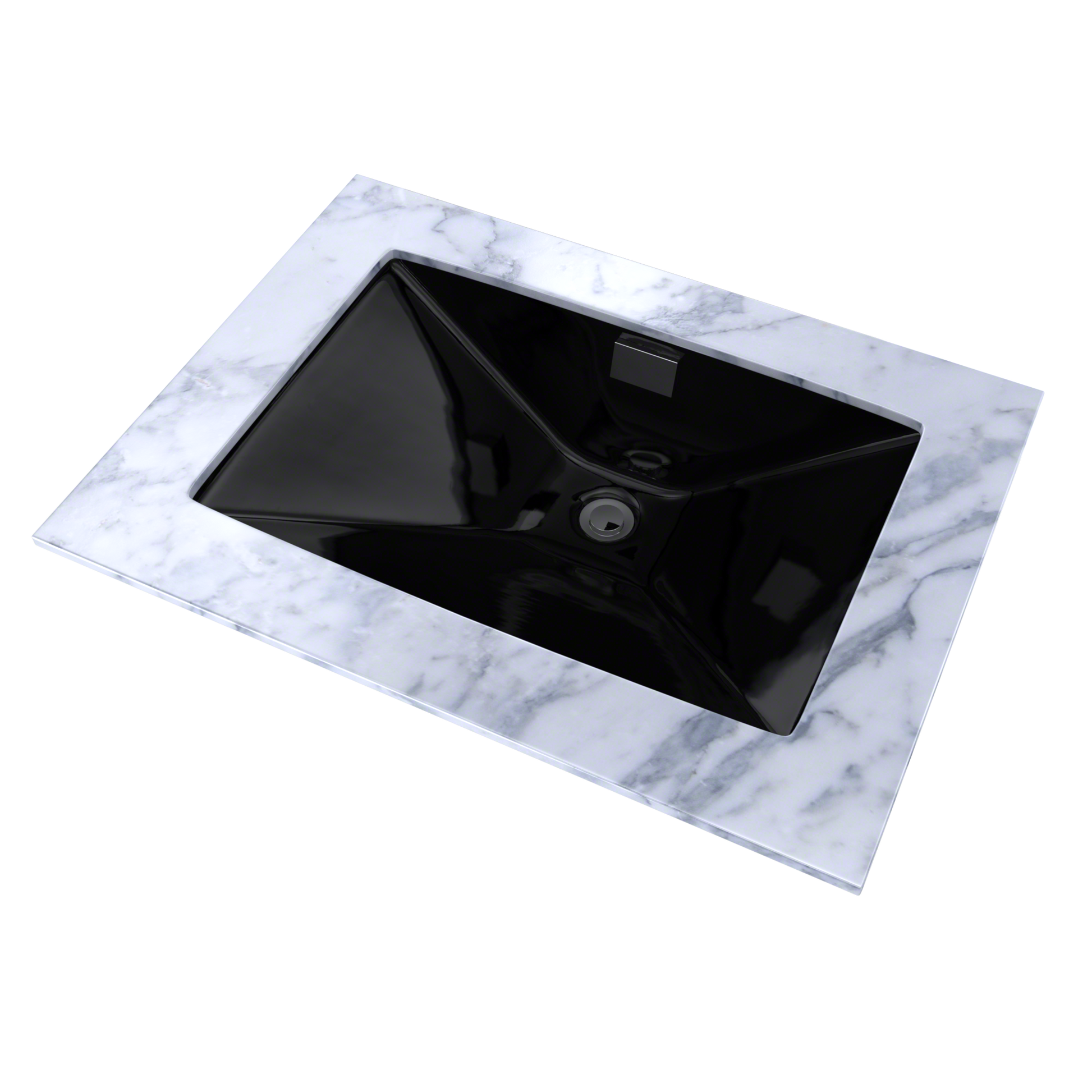Black rectangular undermount sink set in white marble countertop with drain visible.