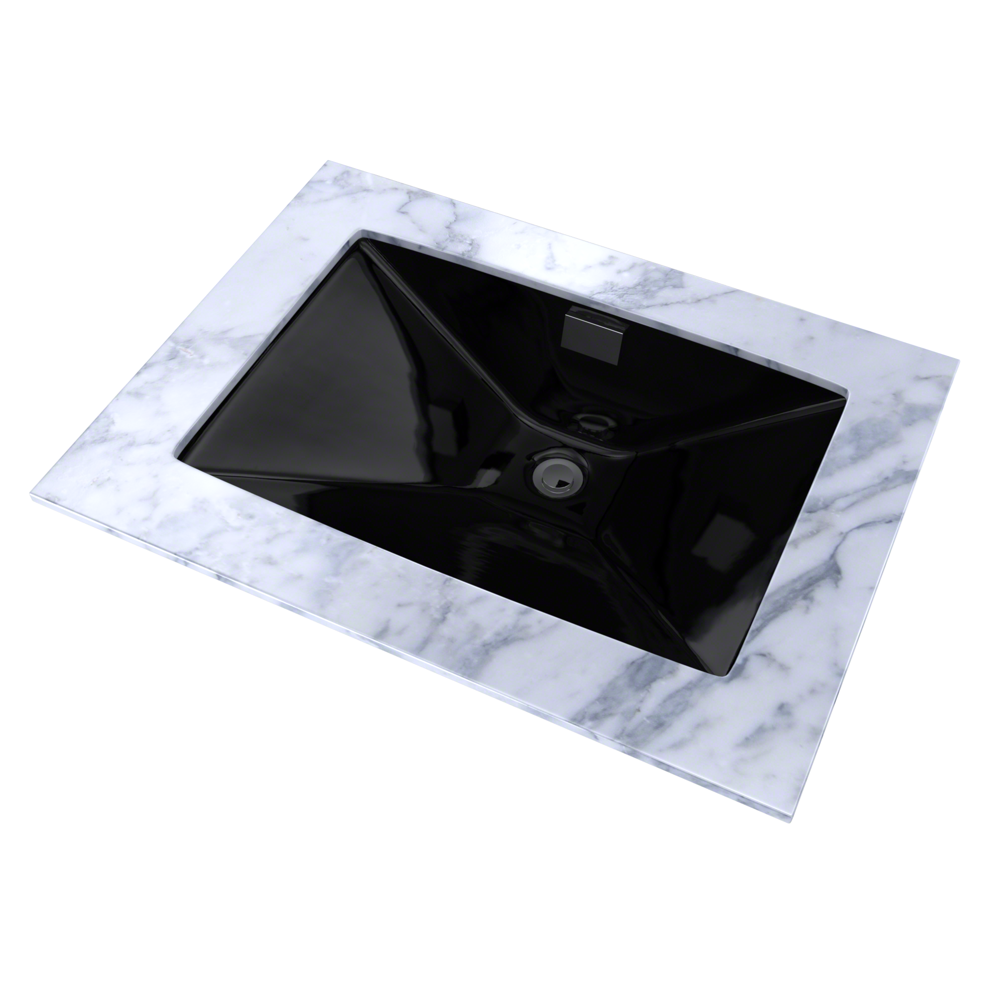 Black rectangular undermount sink set in white marble countertop with drain visible.