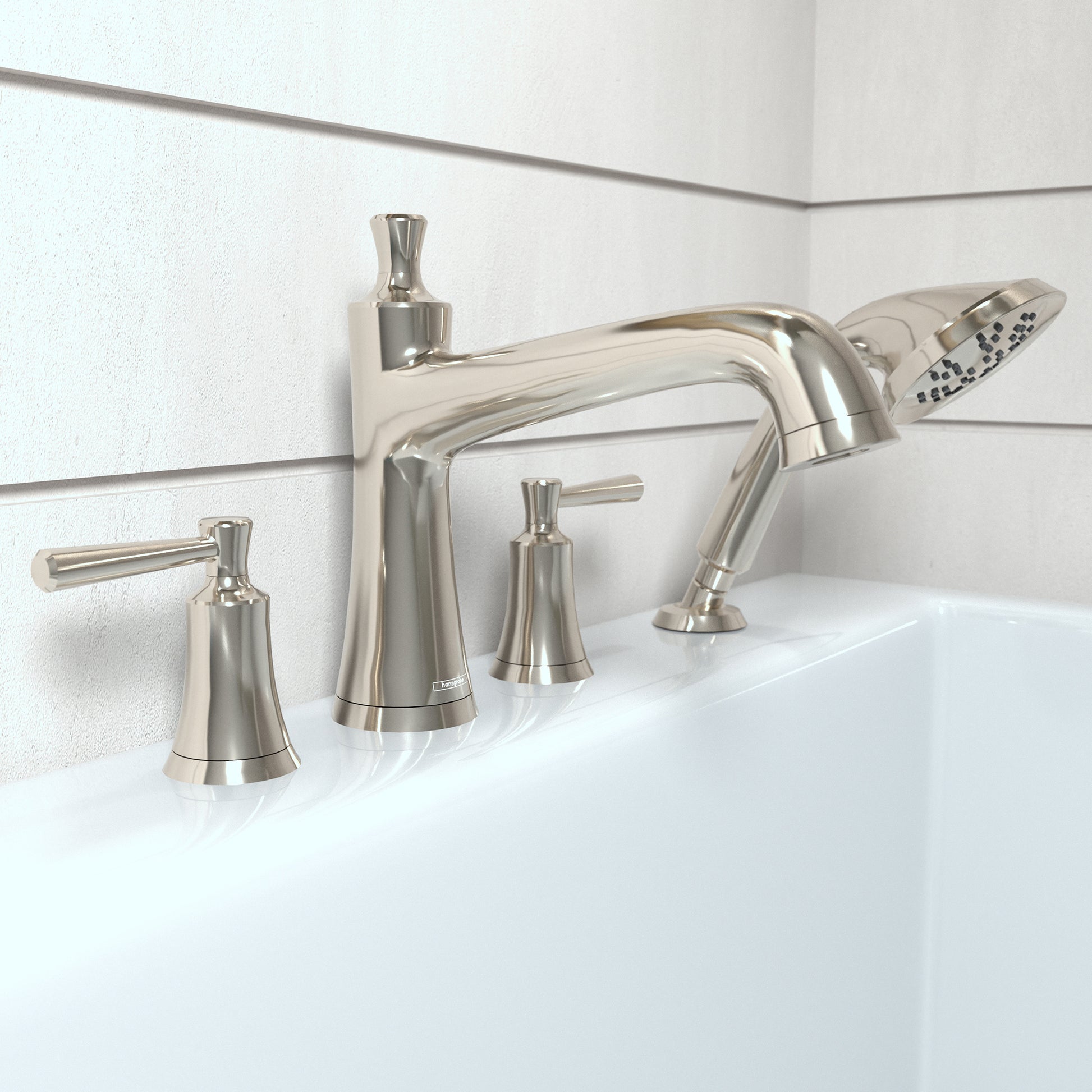 Polished nickel four-hole roman tub faucet set with curved spout, two handles, and detachable handshower on white bathtub rim