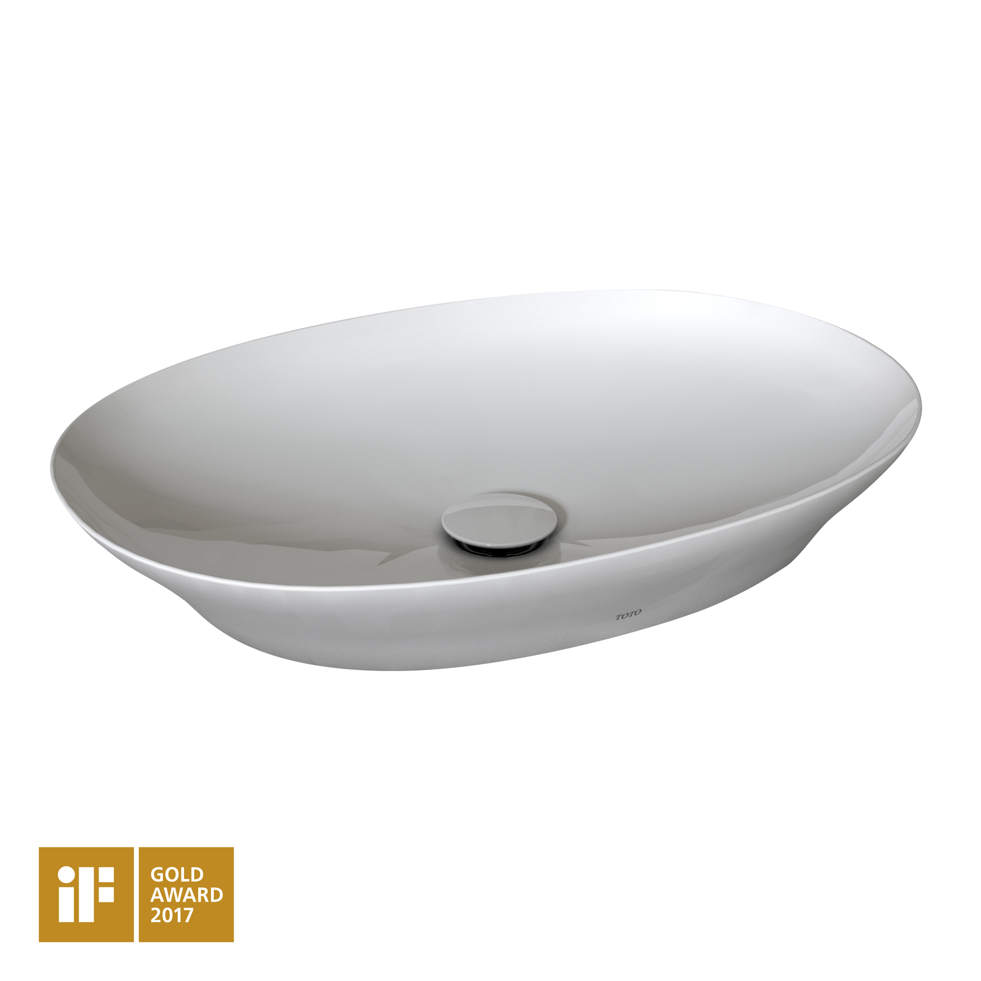 White oval vessel sink with chrome drain and Toto branding on interior.