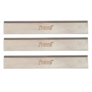 Three rectangular high speed steel planer knives with dark cutting edges and Freud branding stamped on light-colored bodies.