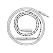 White coiled sensor cable with connectors at each end, displayed in a circular arrangement.
