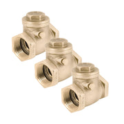 Three bronze tank tees with threaded ports and hex-head caps arranged in a row.