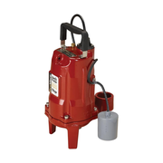 Red cast iron grinder pump with black discharge hose and gray float switch attached.