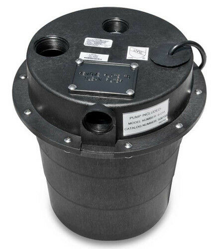 Black cylindrical water removal system with threaded ports, control panel on top, and multiple identification labels.