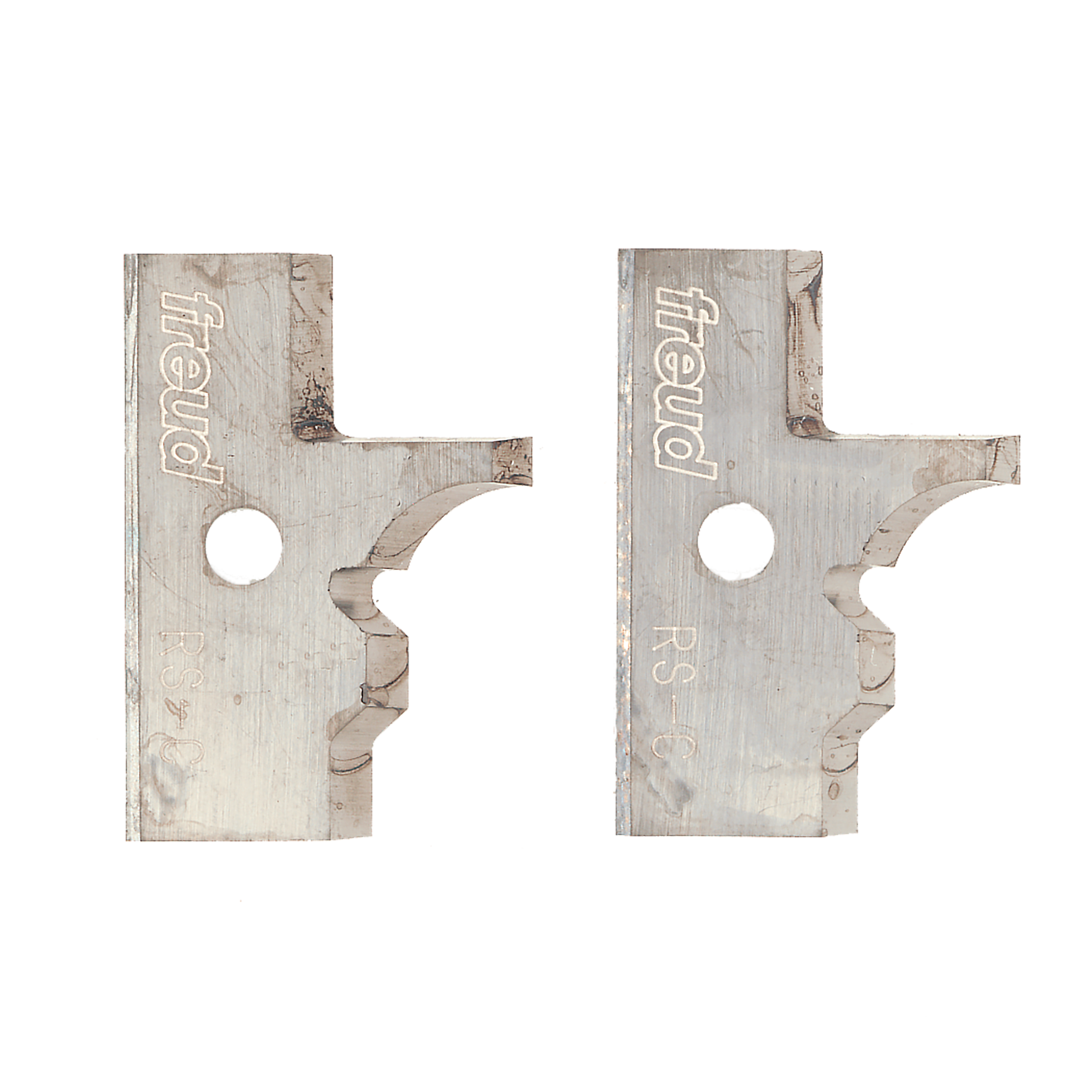 Pair of metal router knife blades with Freud branding and curved cutting edges for rail and stile profiling.