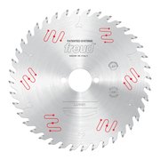 Freud 180mm circular saw blade with carbide-tipped teeth, center arbor hole, and red patent system markings on silver steel b