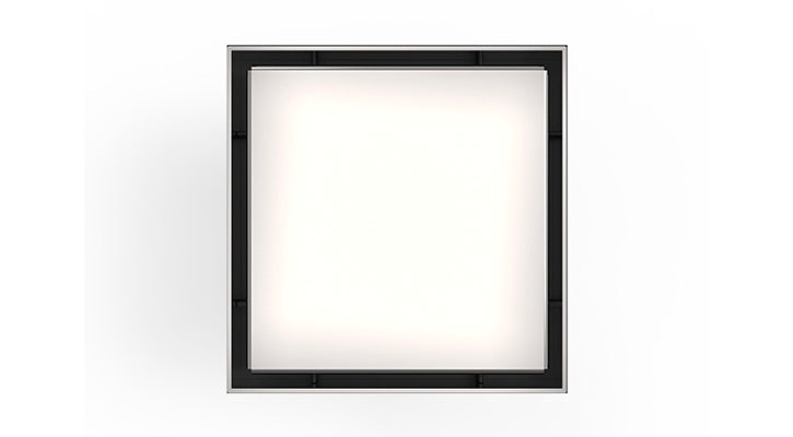 Square stainless steel linear drain with black frame and polished surface, 5 inches by 5 inches.