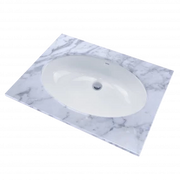 White oval ceramic sink with chrome drain on marble countertop surface.