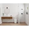 Matte black pressure balance valve shower combo with single handle mounted on white subway tile wall above wooden vanity.