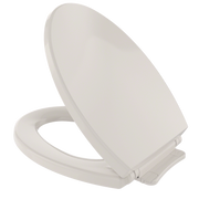 Sedona beige elongated toilet seat and lid with slow-close hinges in open position.