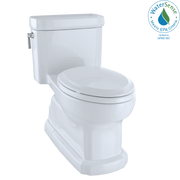 Cotton white elongated two-piece toilet with soft-close seat and chrome supply line visible on tank side.