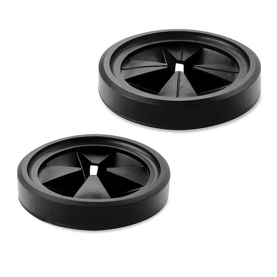 Two black rubber mounting gaskets with center posts and radiating fins for garbage disposal installation.