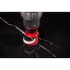 Milwaukee 3/4" diamond one-piece hole saw with red band and black shank on dark background.