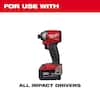 Milwaukee red and black cordless drill with Shockwave impact hole saw bit attachment.