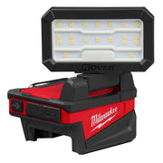 Milwaukee M18 ROVER compact flood light with LED panel, red and black housing, and folding design.