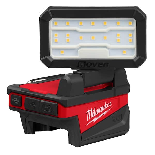 Milwaukee M18 ROVER compact flood light with LED panel, red and black housing, and folding design.