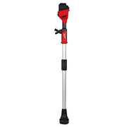 Red and black stick transfer pump with extended shaft and brush attachment at base.