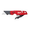 Red and black folding utility knife with blade storage compartment and extended blade.