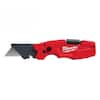 Red and black Milwaukee folding utility knife with multiple blade positions and compact design.