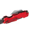 Red folding utility knife with black grip and retractable blade.