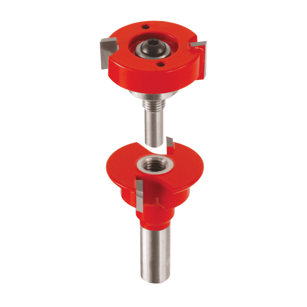 Red router bit set with two cutting heads and metal shafts for rail and stile woodworking applications.