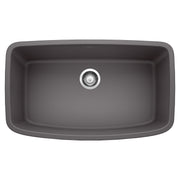 Cinder-colored undermount kitchen sink with single basin and chrome drain strainer.