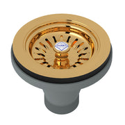Brass basket strainer with radial slots and rubber gasket, featuring Shaw's logo centerpiece.
