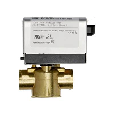 AutoFlush system with white control module and brass valve body with three ports for steam generator connection.