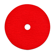 Red circular sanding disc with white center hole and textured abrasive surface.