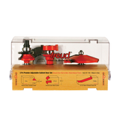 Three red router bits with silver shanks displayed in clear plastic case over wooden base with labeled diagrams.
