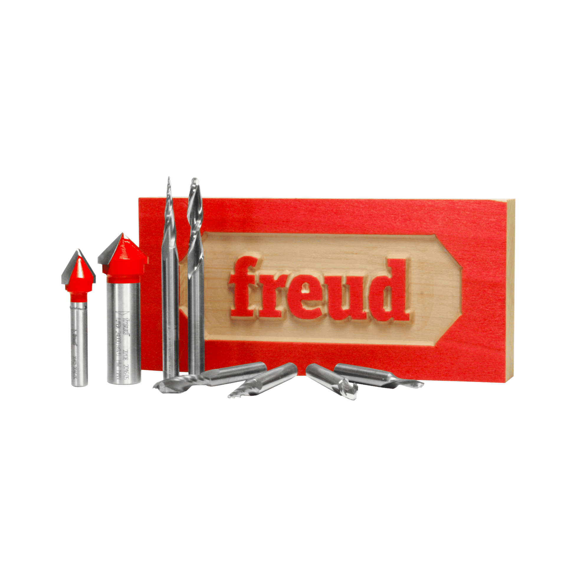 Eight CNC router bits with red and silver cutting heads arranged next to red box with wooden sample showing "freud" text.