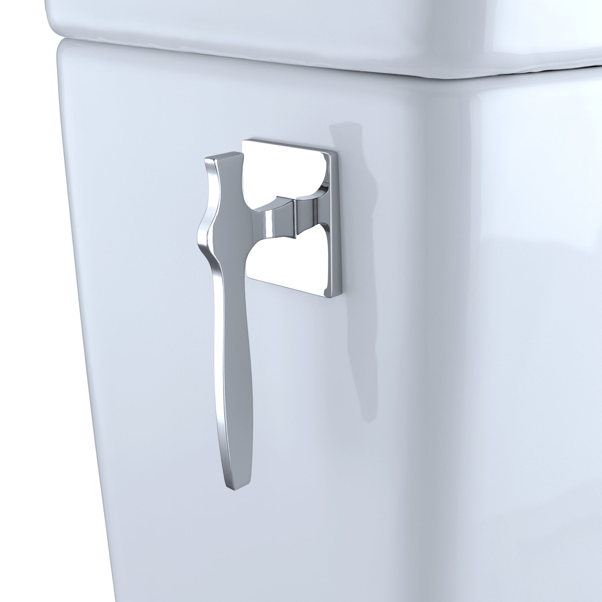 Bone-colored elongated toilet with chrome lever handle mounted on tank side.