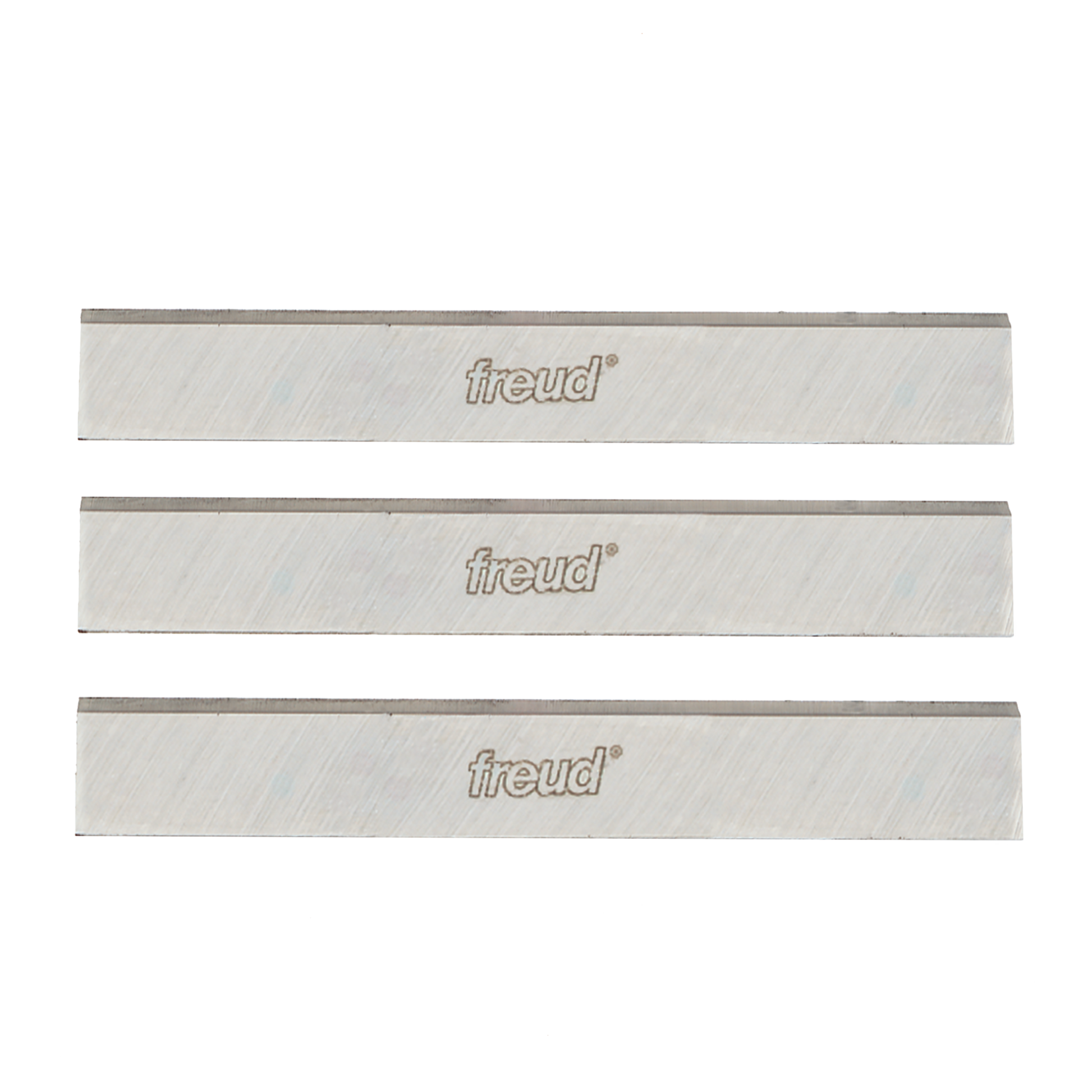 Three rectangular high speed steel planer and jointer blades with Freud branding and dark cutting edges.