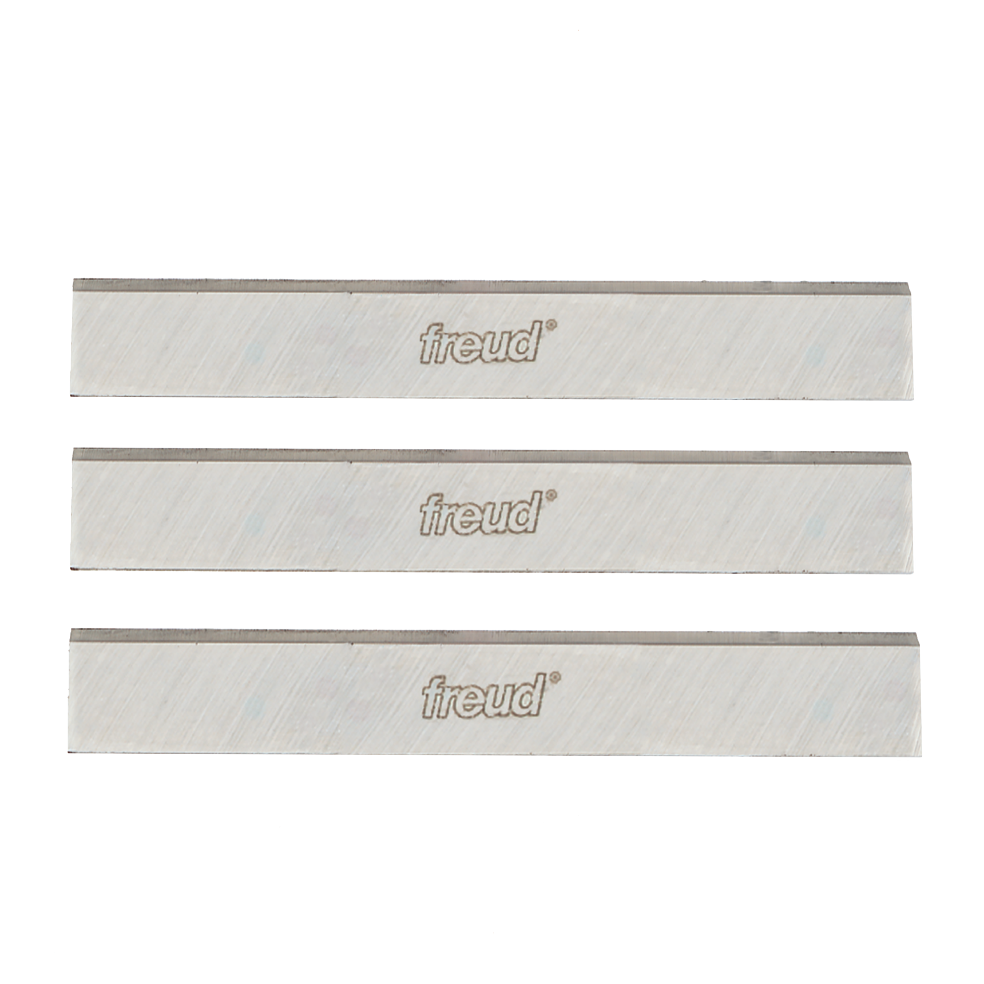 Three rectangular high speed steel planer and jointer blades with Freud branding and dark cutting edges.