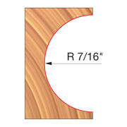 Router bit with convex radius cutting edge marked R 7/16" on wood sample showing curved profile.