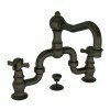 Bronze bridge faucet with two handles and curved spout for bathroom sink.