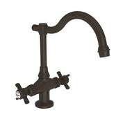Oil rubbed bronze bar faucet with curved spout and dual cross handles on round base.