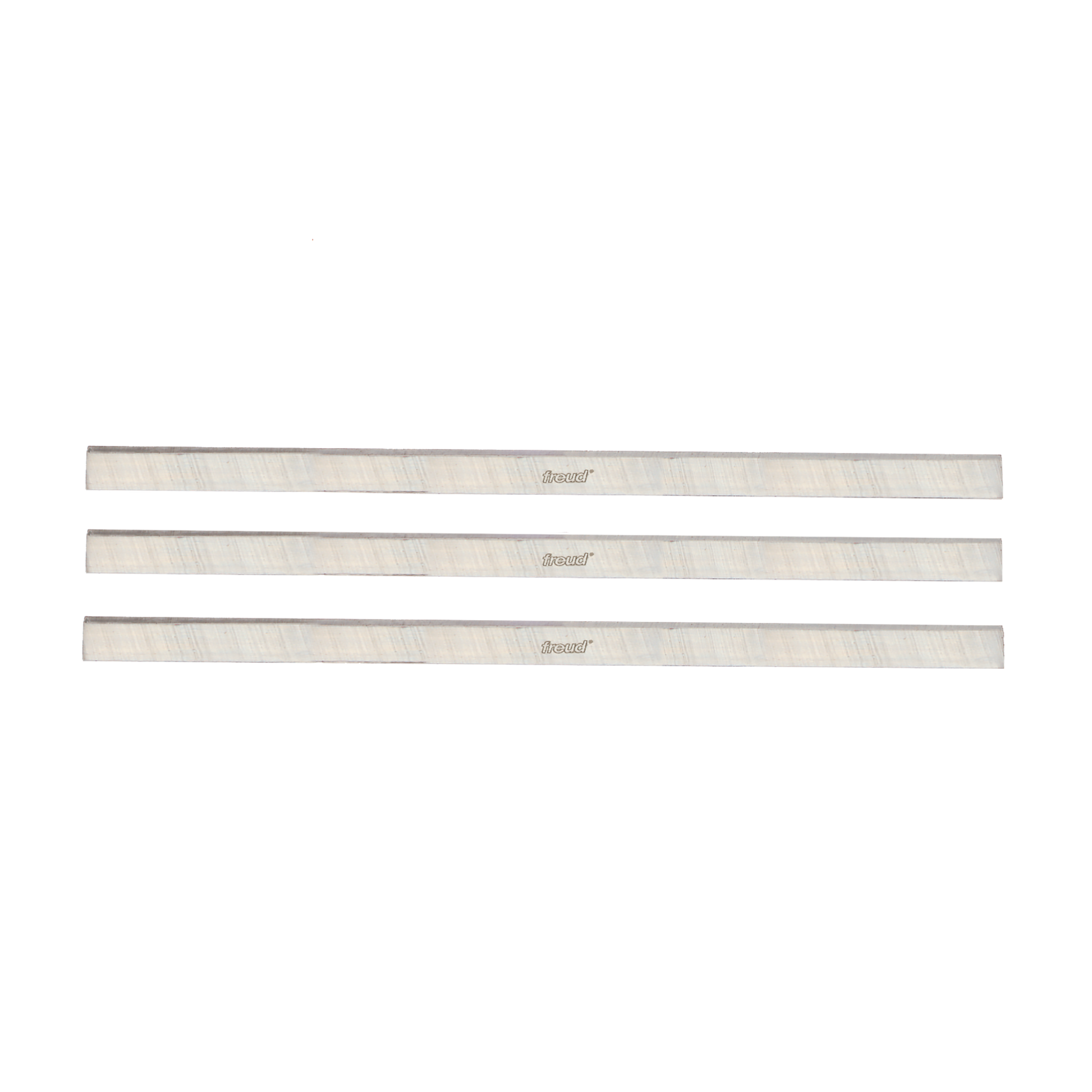 Three metal planer and jointer knife blades with Freud branding arranged horizontally.