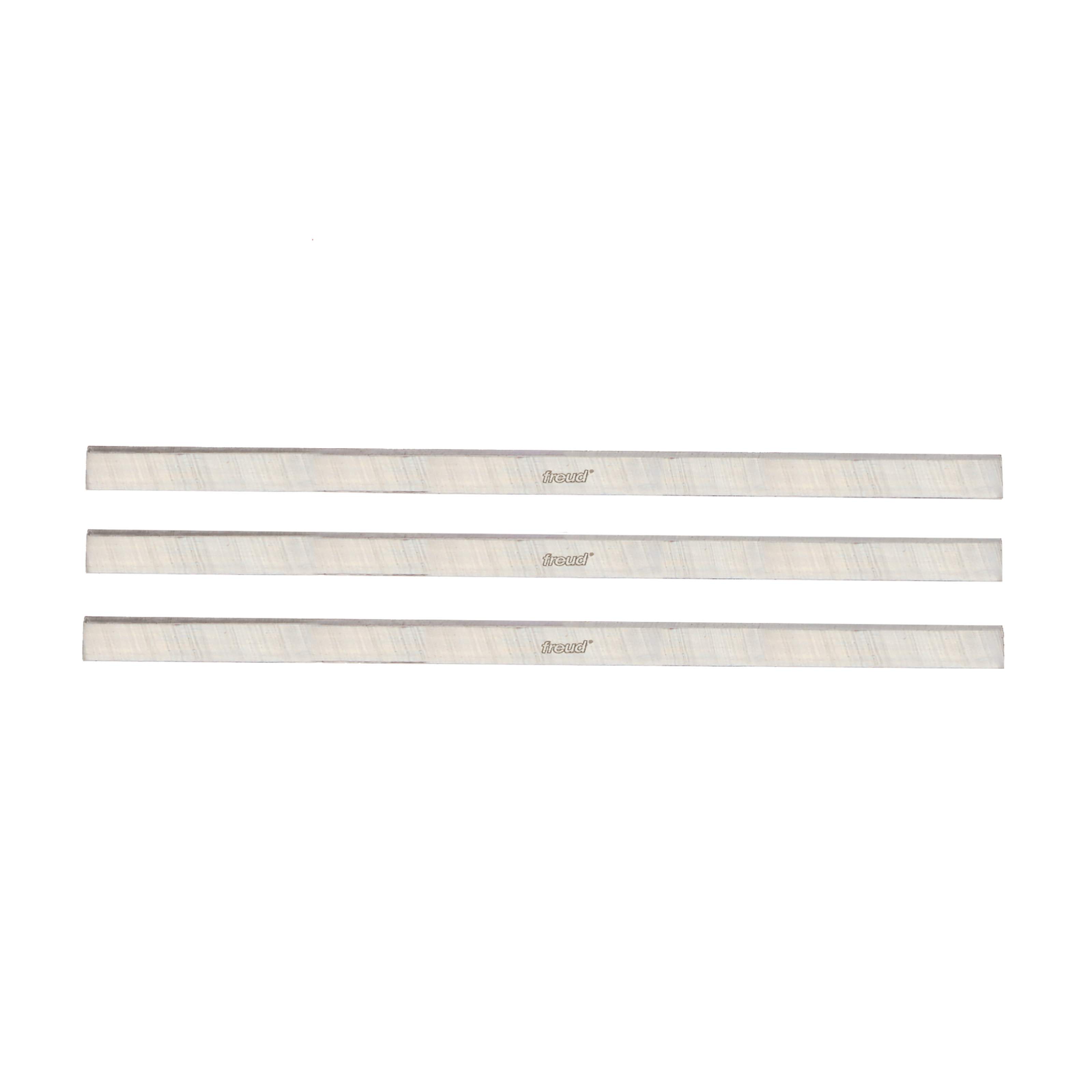 Three metal planer and jointer knife blades with Freud branding arranged horizontally.