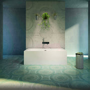 White rectangular freestanding soaker bathtub with curved sides and single faucet in modern bathroom setting.