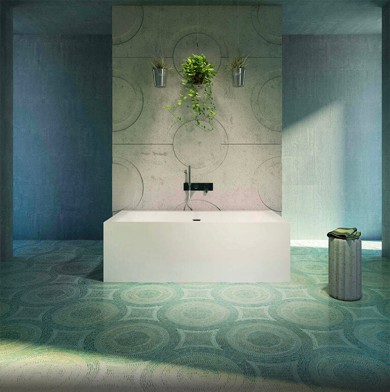 White rectangular freestanding soaker bathtub with curved sides and single faucet in modern bathroom setting.