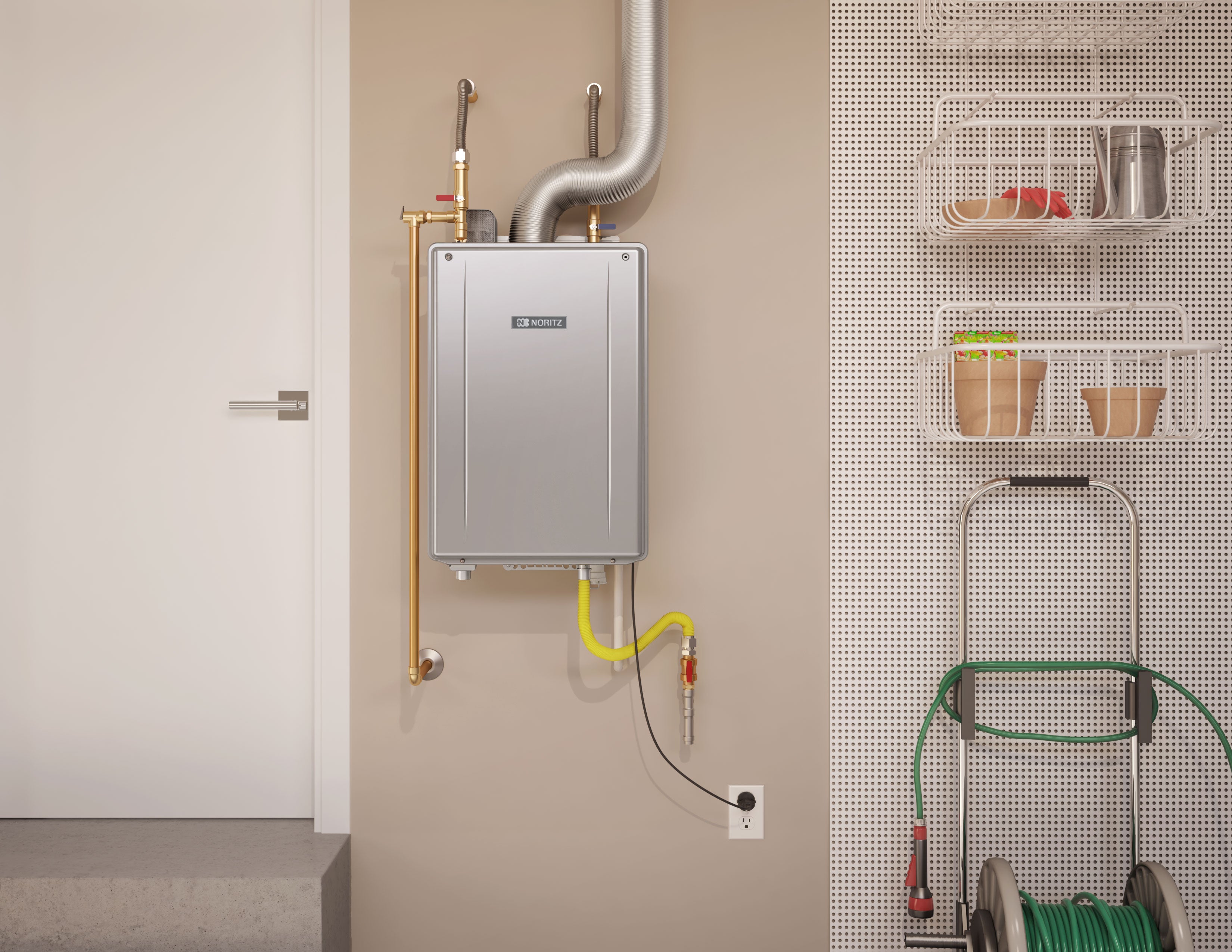 Noritz tankless water heater mounted on wall with metal exhaust pipe, brass fittings, and yellow gas line connections.