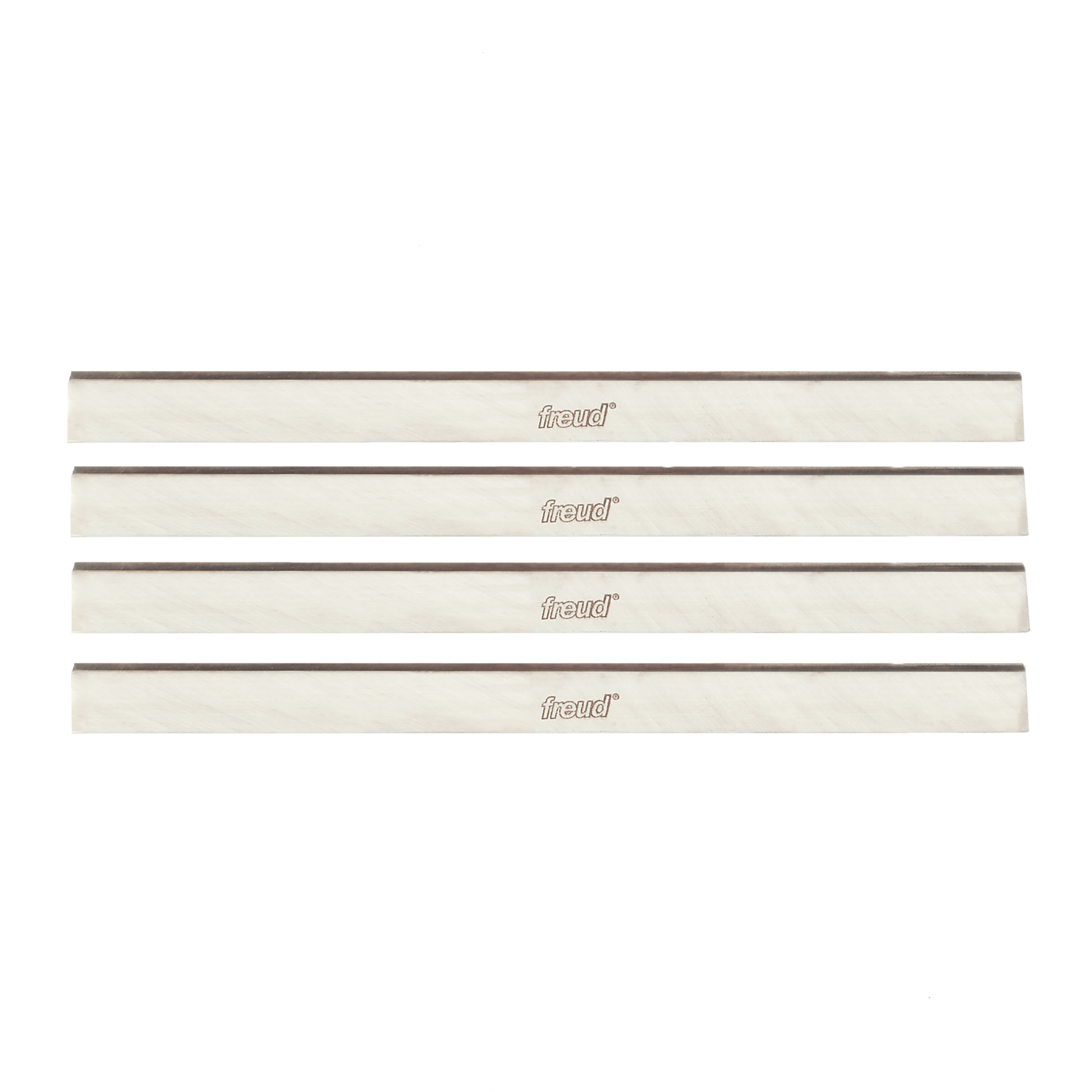 Four stacked metal planer and jointer knives with dark cutting edges and cream-colored bodies marked with Freud branding.