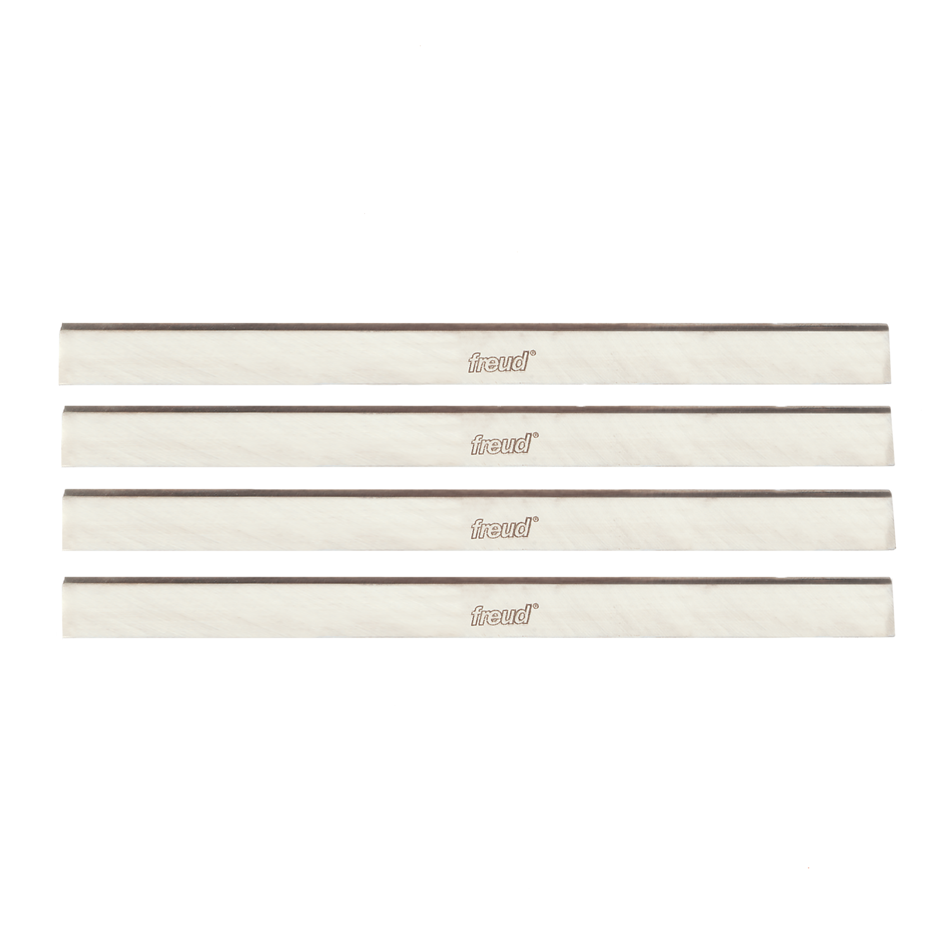 Four stacked metal planer and jointer knives with dark cutting edges and cream-colored bodies marked with Freud branding.