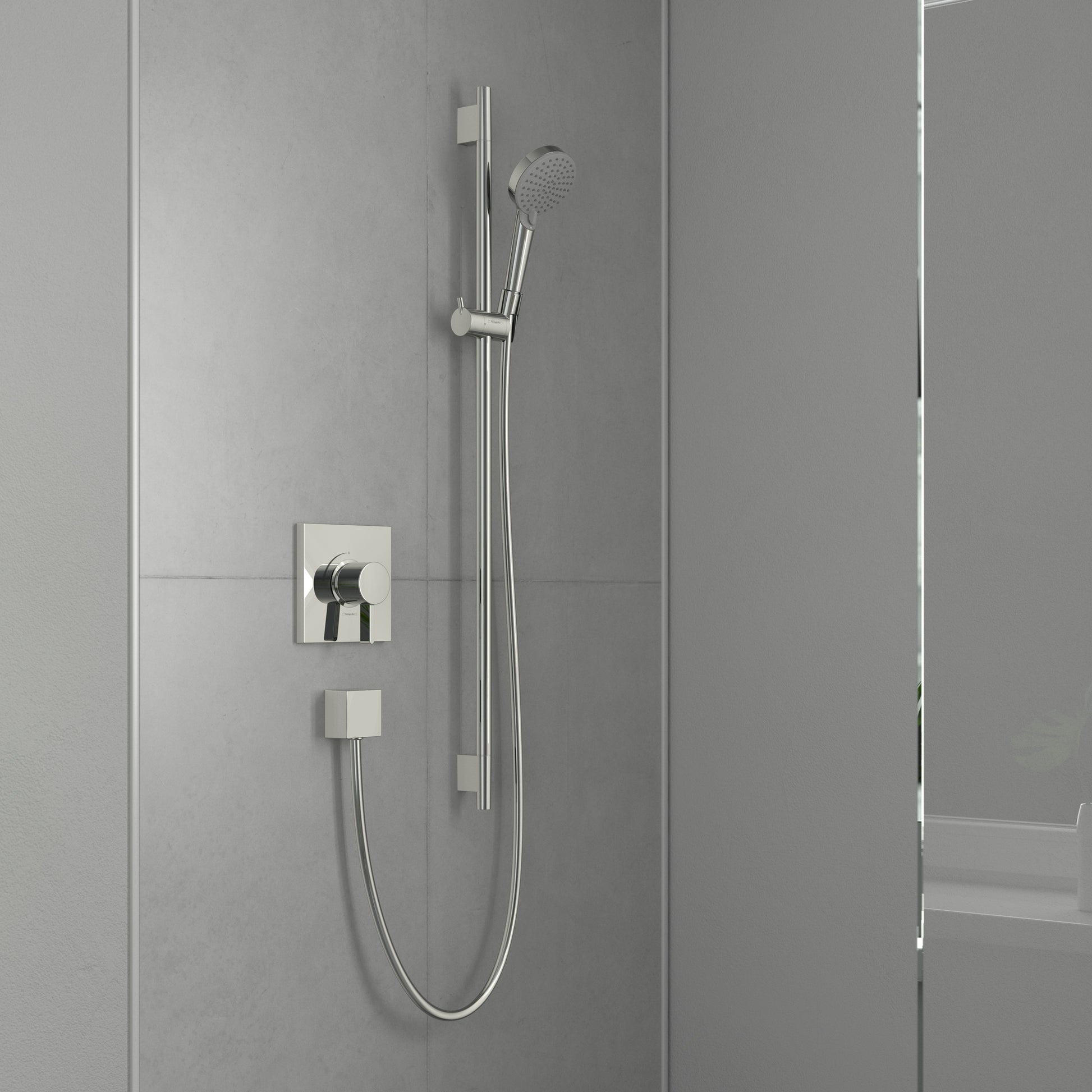 Chrome wallbar shower set with hand shower head, vertical rail, and dual control valve mounted on tile wall.