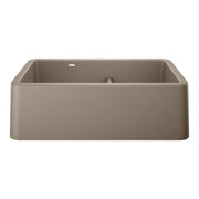 Truffle-colored double bowl farmhouse sink with low divide and apron front in rectangular shape.