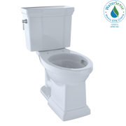 White two-piece elongated toilet with tank, bowl, and supply line visible from angled view.